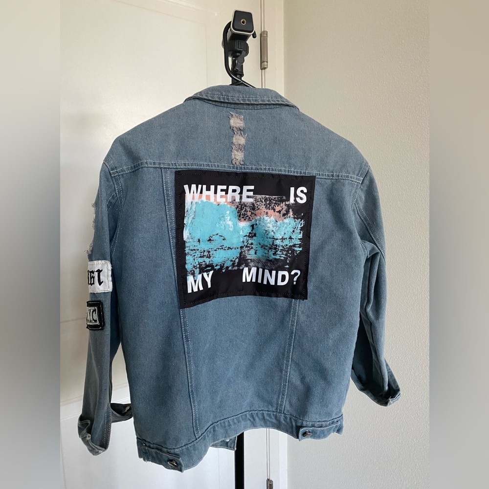 Cool denim jacket with patches on them